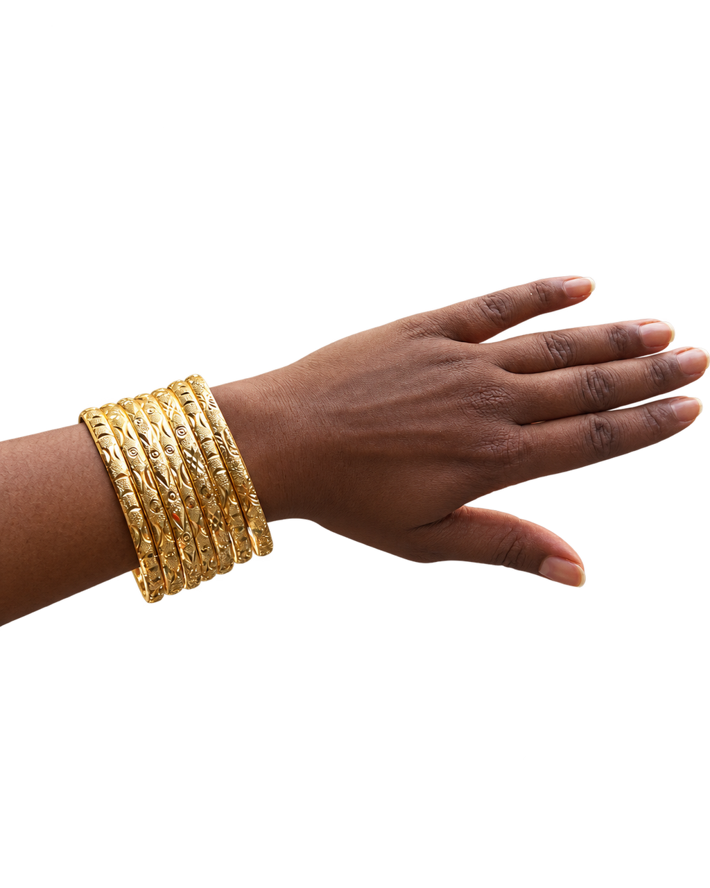 Stack Haus diamond-cut gold bangles stacked on wrist