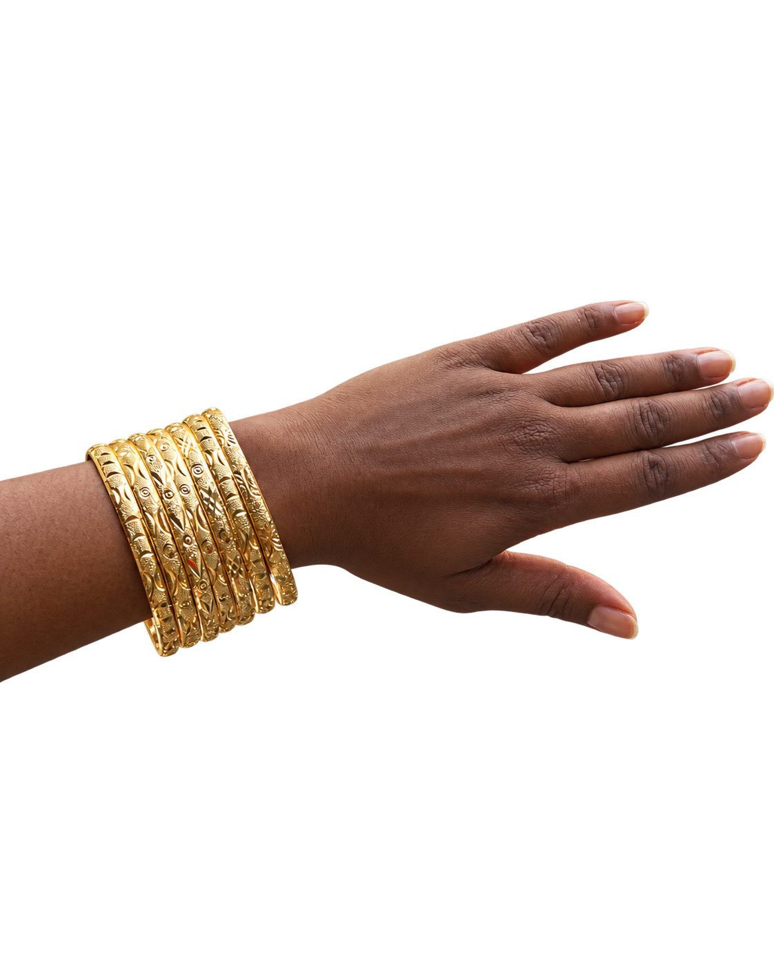 Stack Haus diamond-cut gold bangles stacked on wrist