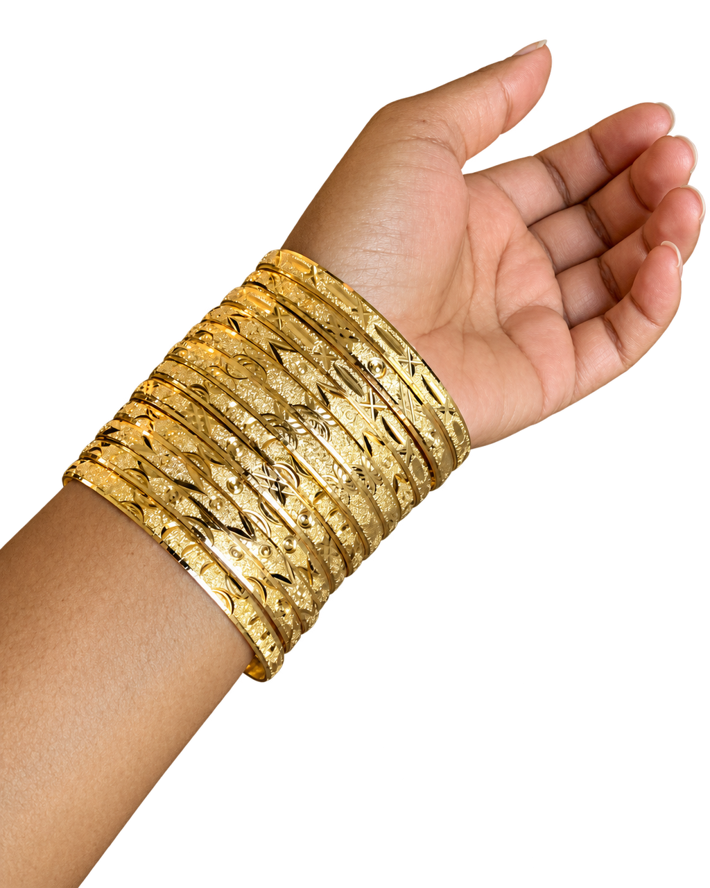 Stack Haus diamond-cut gold bangles shown with hand turned up in a full wrist stack